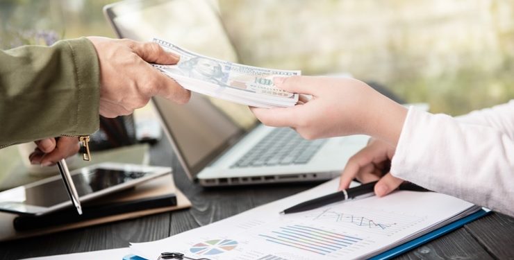 A person receiving a loan in cash.